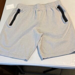 4 pairs of Old Navy Gray Athletic Shorts with Black Zippers. Size Medium.